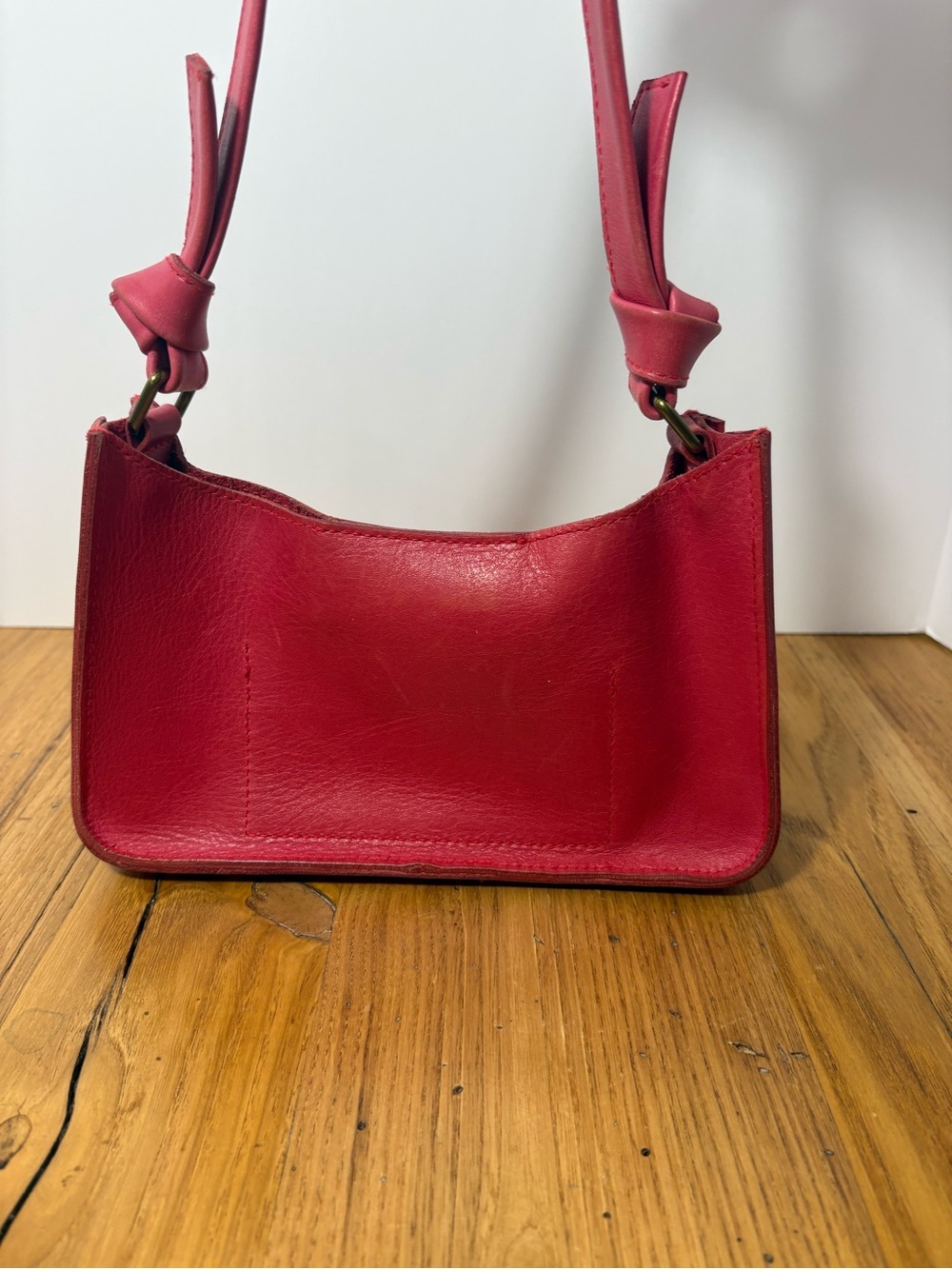 MADEWELL || Sydney Small Leather Hobo Bag in Rosy Hibiscus Pink. Knotted handle.